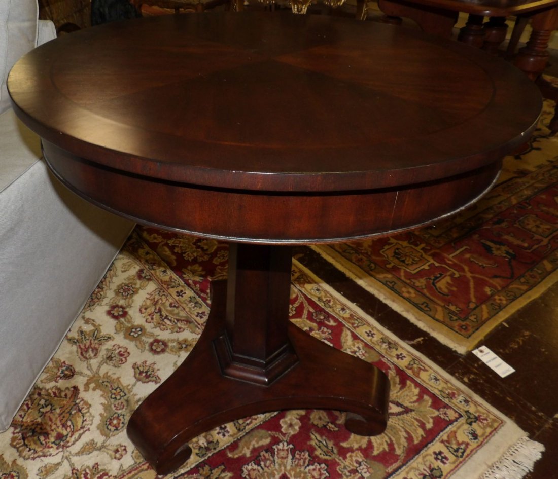 EMPIRE STYLE MAHOGANY SIDE TABLE: Empire Style Mahogany Side Table. Measures 30" tall x 30" wide. Overall condition is good. Minor surface wear. No damage. Starting Bid $50. Auction Estimate $150 - $200.