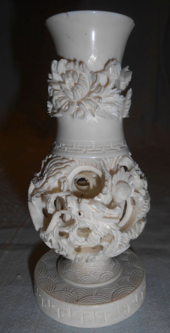 Antique Carved Ivory Puzzle Vase: Antique Carved Ivory Puzzle Vase. Measures 4-1/2" tall. Condition is very good with a couple small flea bites on rim. No Damage.