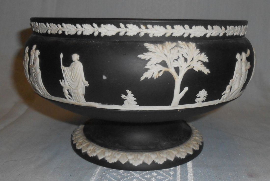 Wedgwood Black Basalt Jasperware Bowl: Wedgwood Black Basalt Jasperware Bowl. Measures 9" round x 5" tall. Condition is good with typical surface scratches from age. No Damage. Starting bid $100.