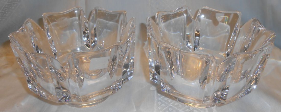 Pair (2) Orrefors Corona Bowls: Pair (2) Orrefors Corona Bowls. Each measures 6" round x 4" tall. Condition is good with typical surface scratches from age. No Damage. Starting bid $20.