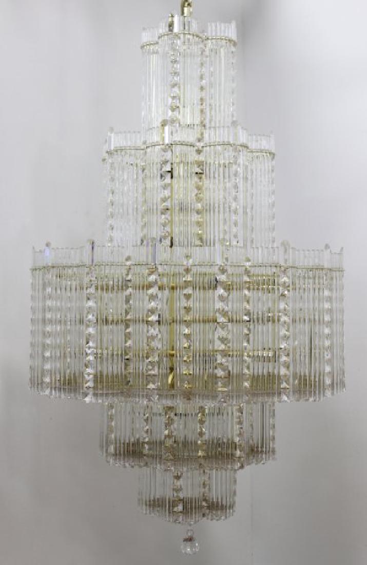 1970s Gilded Brass 50-Light Crystal Chandelier: Approx. 48" H x 30" W. 2 crystal rods missing.