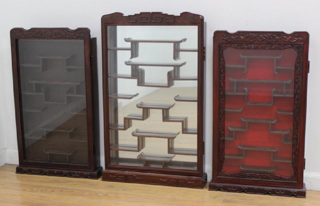 3 Chinese Hanging Hardwood Cabinets: Largest approx. 32" x 19 1/2". From a Long Island, NY estate.