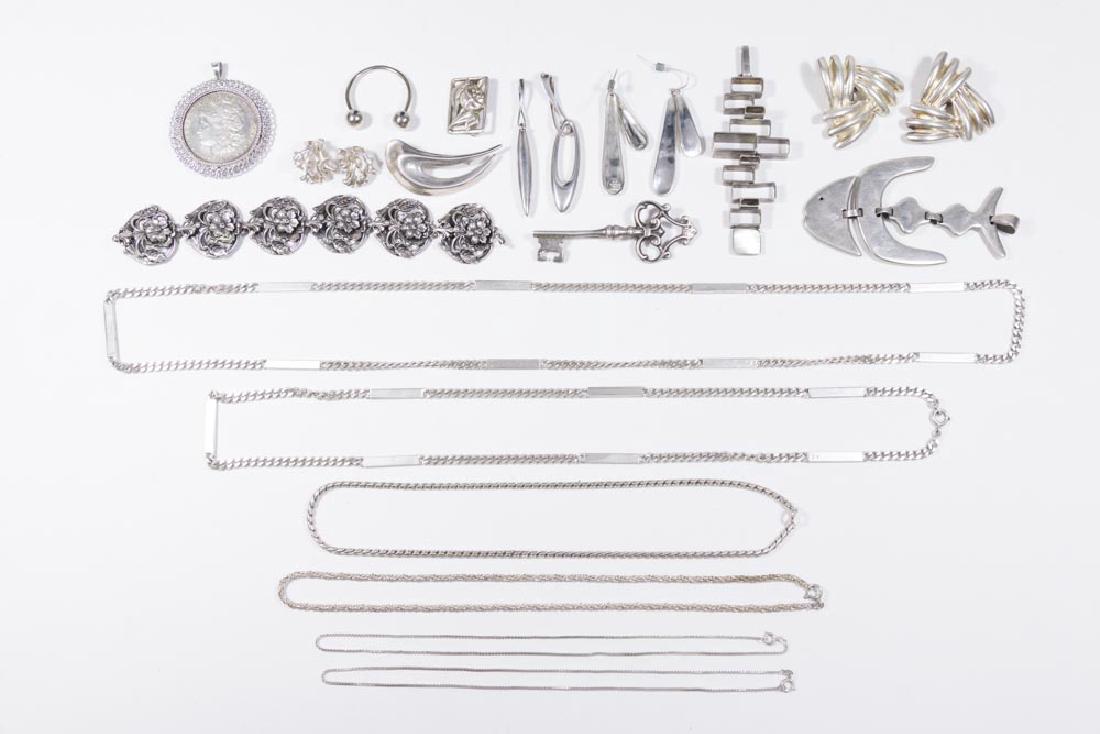 Group lot of Sterling Silver Jewelry: Includes pendants, chains, earrings. Including Robert Lee Morris and other makers. (5281) Good condition.