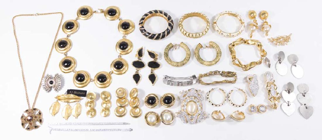 Lot of costume jewelry: Includes bracelets, earrings, pins, Trifari, R.J. Graziano, Robert Lee Morris, Yosca, Louis Feraud and others. (5281) Good condition.
