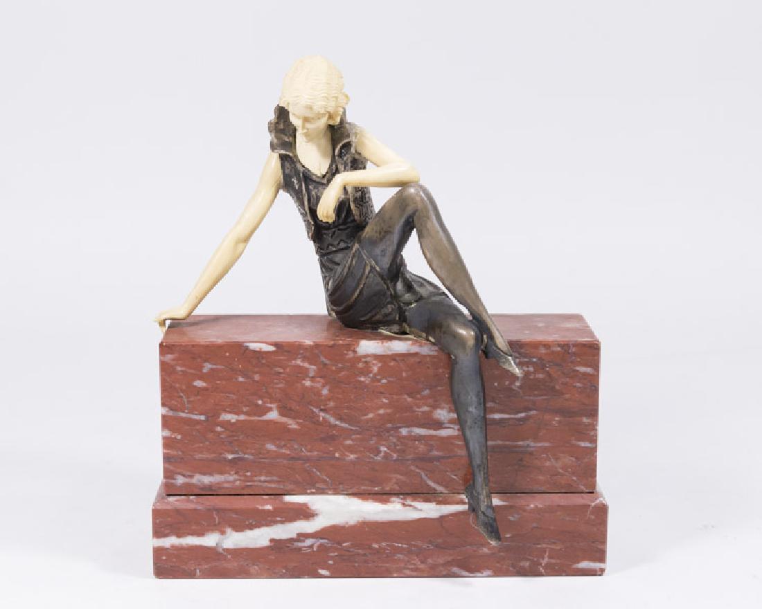French Deco Seated Lady on Marble Base: Bronze and Ivoirine. Approx. 9" H x 7 1/2" W x 3" D.