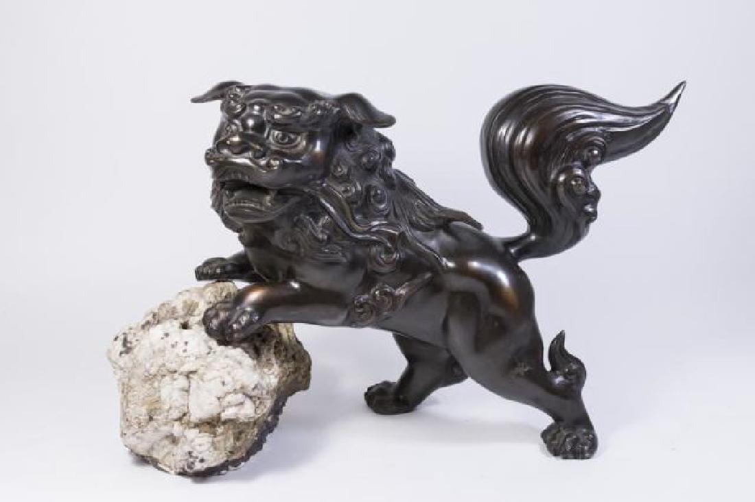 :Bronze Foo Dog on Rock: Approx. 13 1/2" H x 20 1/2" W.