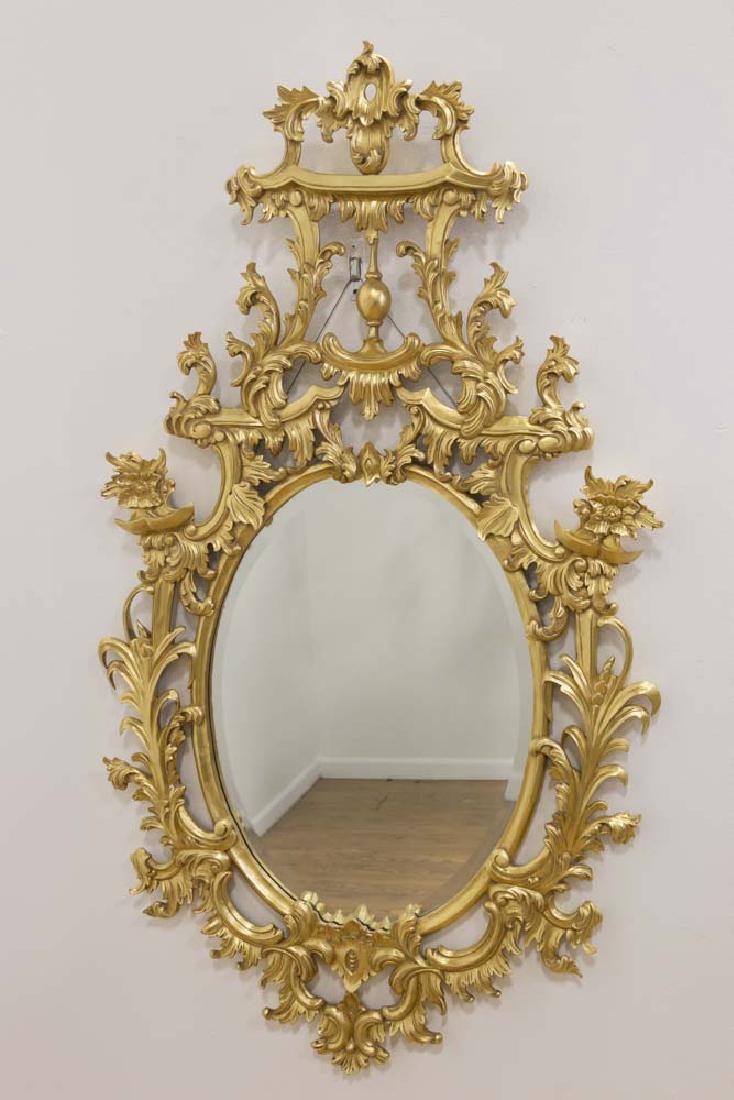Giltwood Rococo Mirror: Contemporary. Approx. 59" H x 33 1/2" W.