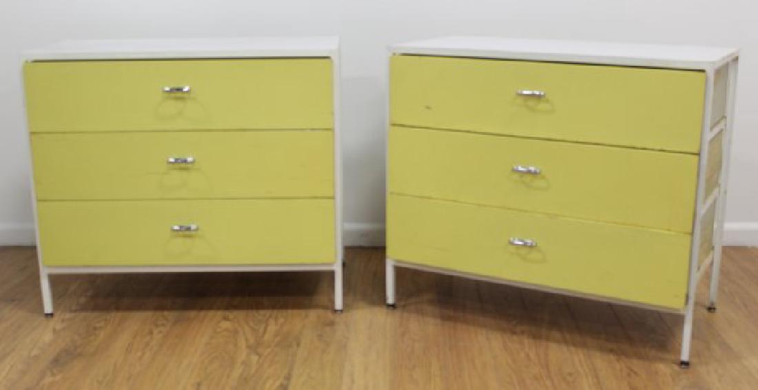 Pair Herman Miller Steel Frame Chests: White and yellow lacquer. Approx. 30" H x 33 1/2" W x 17 1/4" D.
