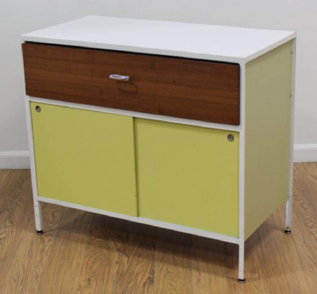 George Nelson for Herman Miller Case Chest: Walnut. Metal. Approx. 30" H x 33 1/2" W x 17 1/4" D.