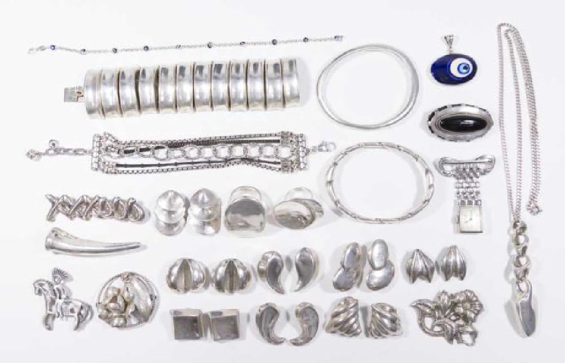 :Group lot of Sterling Silver Jewelry: Includes Robert Lee Morris Earrings, bracelets, other sterling silver pins. (5281)
