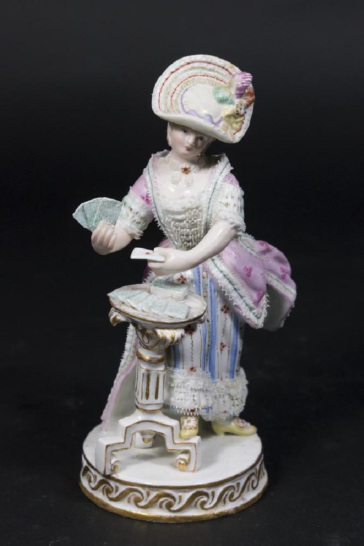 Meissen Porcelain Figurine, Girl Playing Cards: Approx. 6 1/4" H. Restorations.