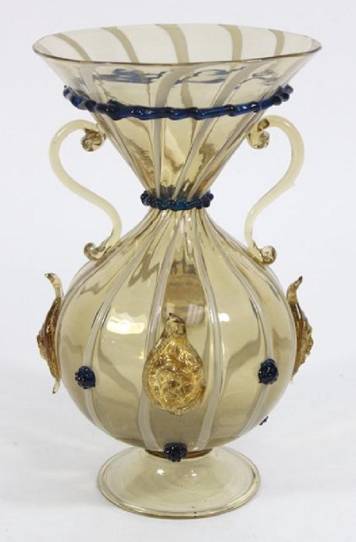 Venetian Gilt Swirl Smoked Glass Vase: Late 19th/early 20th century. Attributed to Salviati & C. Societa Anonima per azioni. Applied with lion's masks. Approx. 9 1/2" H. From a NY estate. (6092) Good condition.