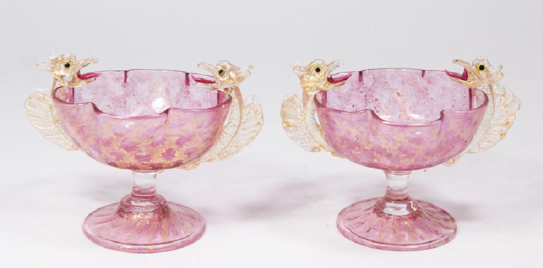 Pair Venetian Gilt Mottled Pink Glass Coupes: Late 19th/early 20th century. Attributed to Salviati & C. Artisti Barovier or Fratelli Toso. With dragon handles. Approx. 3 3/4" H. From a NY estate. (6092) Good condition.