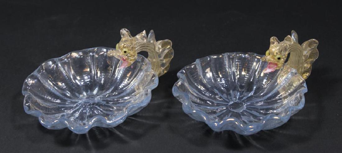 Pair Venetian Gilt Blue Glass Dragon Nut Dishes: Late 19th/early 20th century. Attributed to Salviati & C. Artisti Barovier or Fratelli Toso. Approx. 4 3/4" W. From a NY estate. (6092) Good condition.