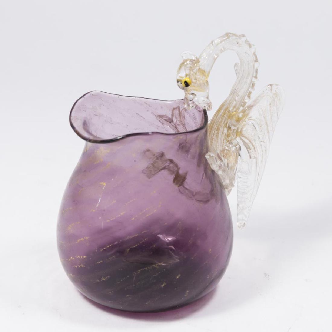 Small Venetian Gilt Purple Glass Dragon Pitcher: Late 19th/early 20th century. Attributed to Salviati & C. Artisti Barovier or Fratelli Toso. Approx. 5" H. From a NY estate. (6092) Good condition.
