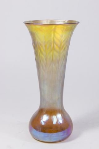 Tiffany Favrile Art Glass Vase: Signed and numbered 285P; 1811. Quill design. Orange lustre. Approx. 9 3/4" H.