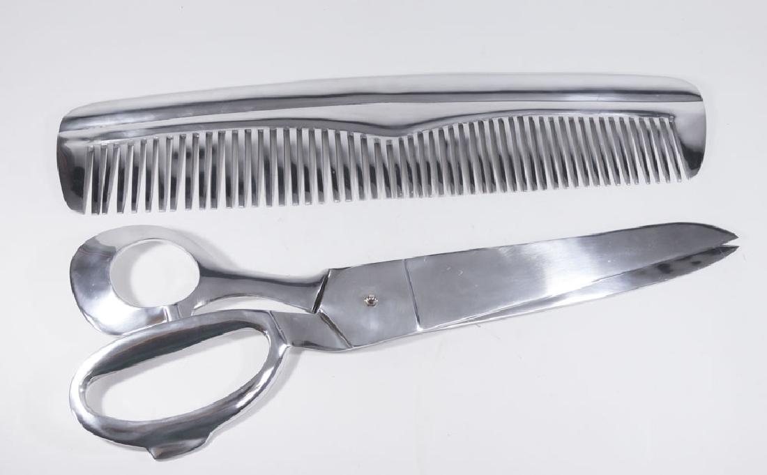 Display Size Chrome Comb & Scissors: Contemporary. Comb approx. 31" H, scissors approx. 29" H. (5290)