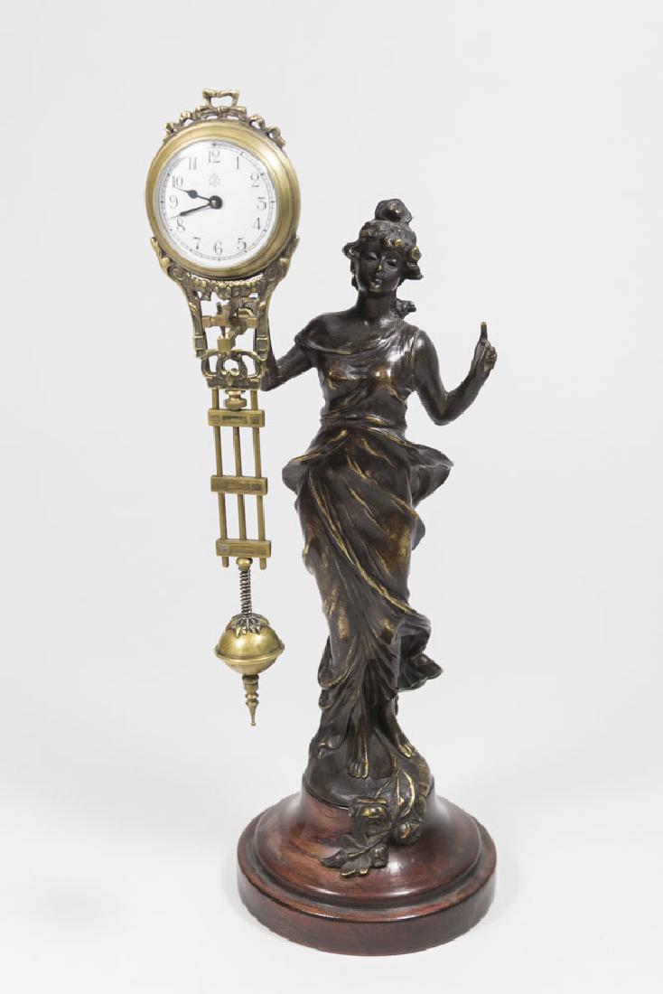 Bronze-Tone Classical Figural Swing Clock (1 of 5)