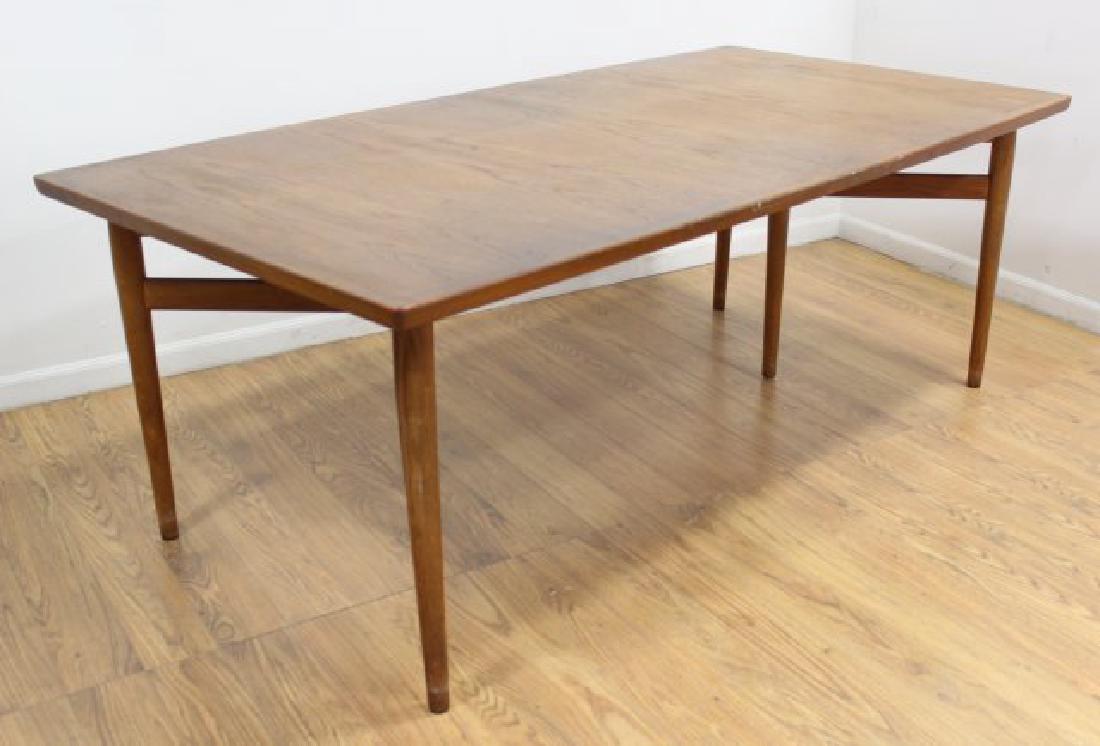 Arne Vodder Teak Dining Table: Circa 1960. 2 leaves. Approx. 28 3/4" H x 41 1/2" W x 79" L.