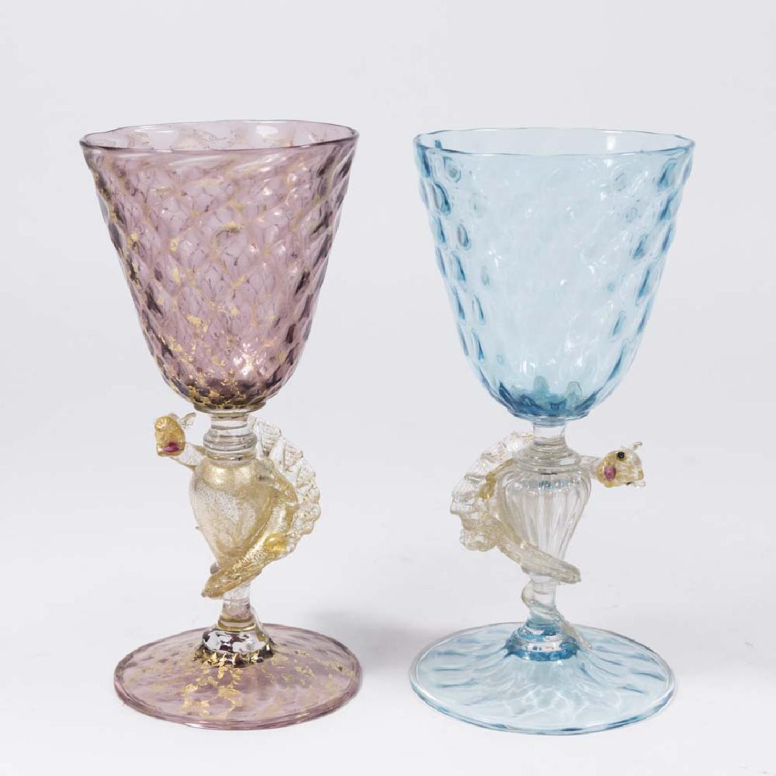 2 Venetian Gilt Violet & Turquoise Glass Goblets: Dragons. Late 19th/early 20th century. Attributed to Salviati & C. Artisti Barovier or Fratelli Toso. Approx. 8" H. From a NY estate. (6092) Good condition.