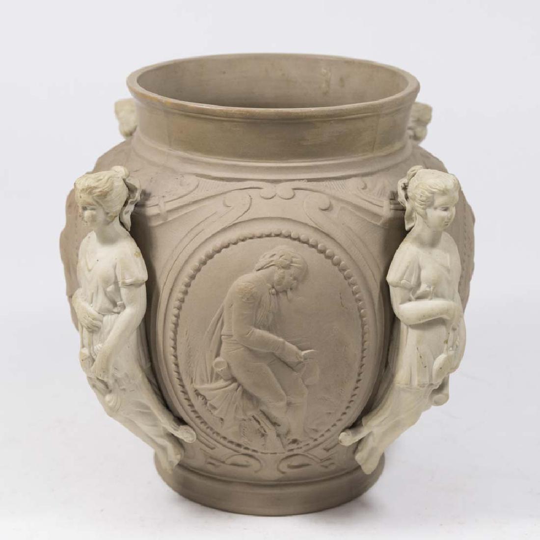 Sarreguemines Faience Clay Finish Bowl: The 4 seasons adorn the vase. Approx. 7" H x 8" W. From the estate of Mark Zulli, antique collector and dealer for 50 years. (6131) Good condition.