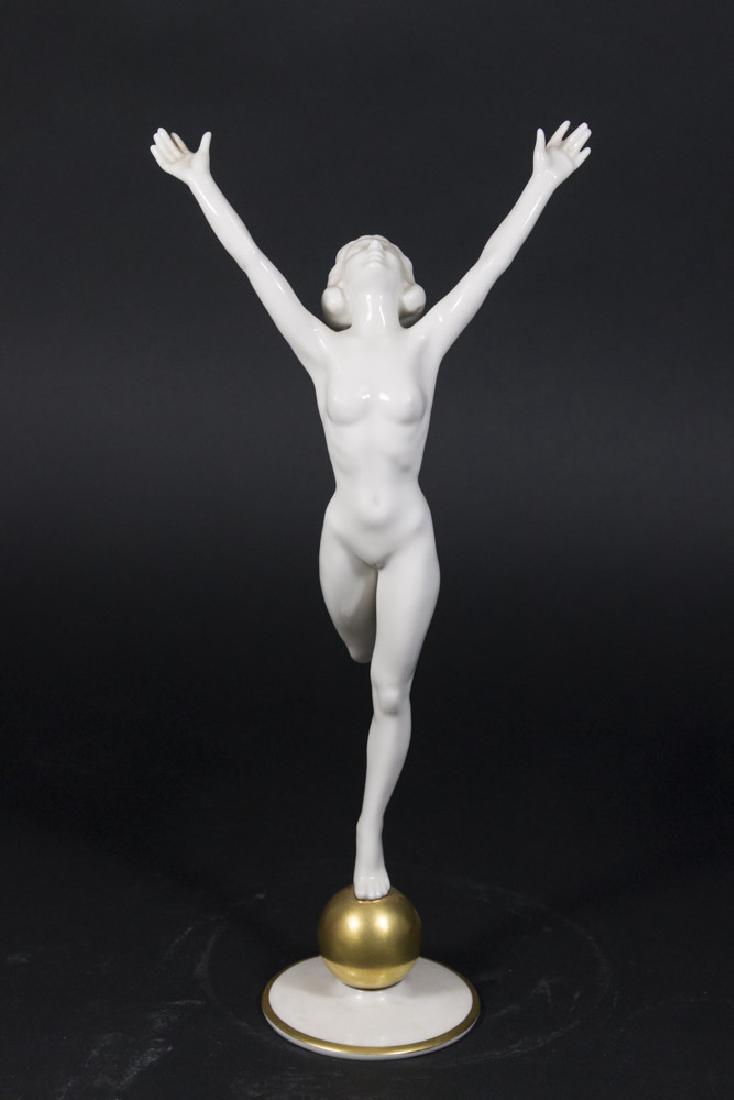 Hutschenreuther Figurine, Nude Female on Ball: Approx. 13 1/2" H. From the estate of John & Doris Resh, antique dealers and collectors for 50 years.