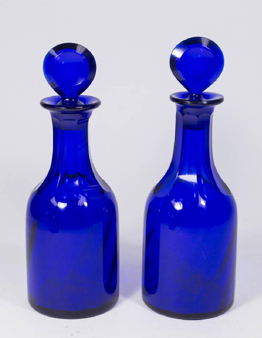 Pair Cobalt Sandwich Glass Bottles: With stoppers. Approx. 11" H. Pontil on bottom.