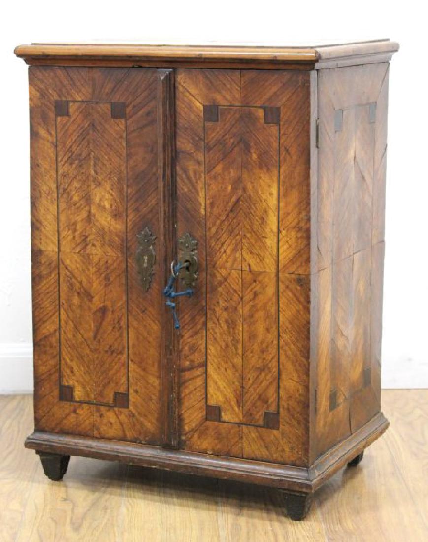 Continental Walnut Veneer Collector's Cabinet: 18th century. With 8 sleeves and key. Approx. 23 1/2" H x 16 1/2" W x 11 1/2" D.