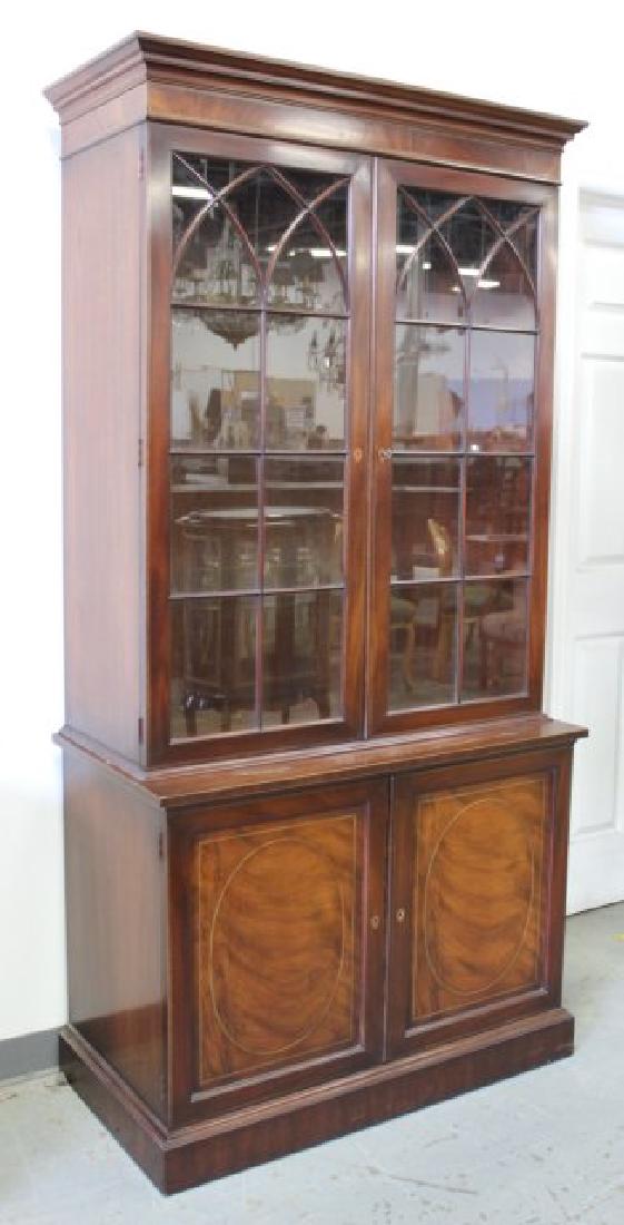 Custom-Made 2-Door Mahogany China Cabinet: With satin inlay trim. 2 pieces. With lighted cabinet. Probably made by Kittinger Co. Approx. 81 1/2" H x 41 W x 21" D.