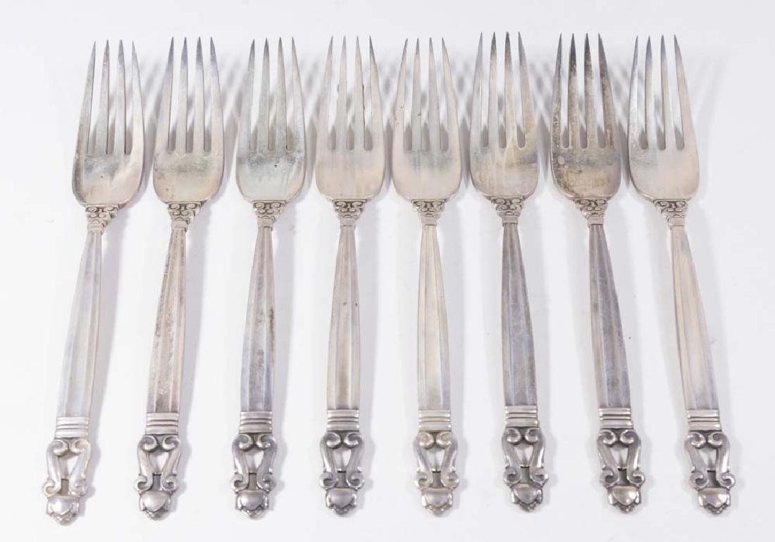 8 Georg Jensen Forks: Acorn pattern. Approx. 7 3/4" L. Approx. 17 ozt (531 grams).