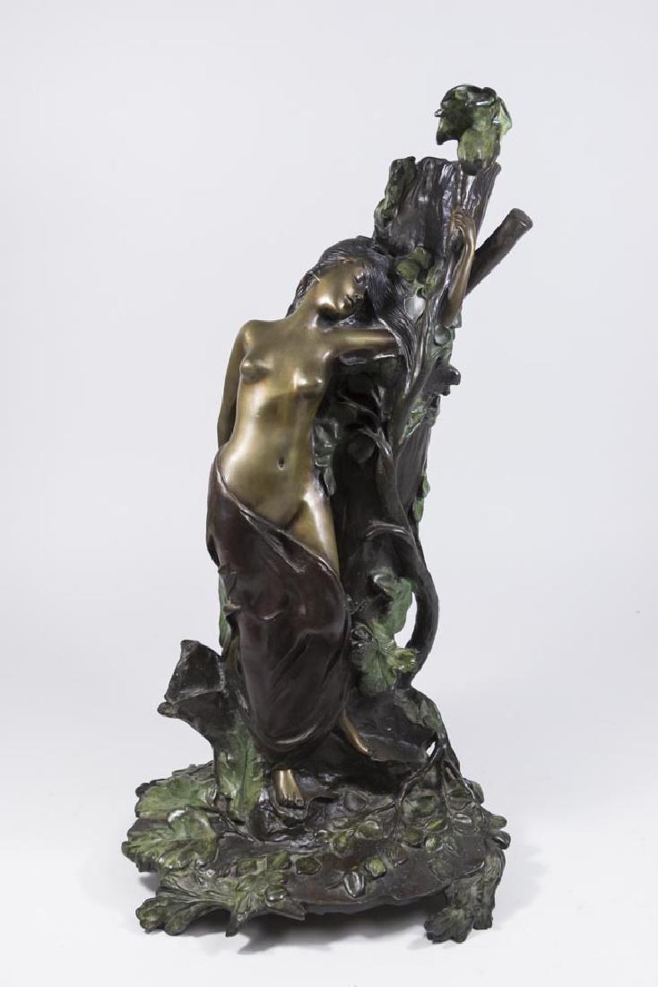 Patinated Bronze Art Nouveau Style Sculpture: Contemporary. Nude reclining on tree trunk. Unsigned. Approx. 22" H. (6114)