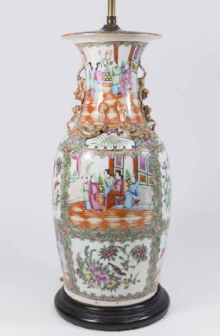Antique Rose Medallion Vase: Mounted as a lamp. Approx. 17 1/2" H x 8 1/4" W. Hairline on top approx. 1" L.
