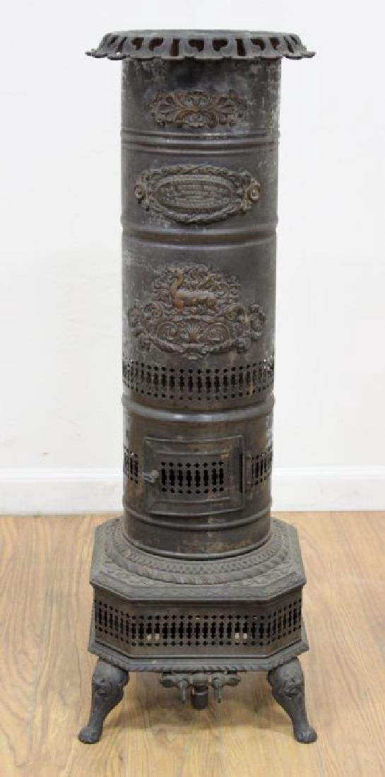 Metropolitan Gas Stove Works Metal Stove: 19th century. Approx. 35 3/4" H. From the estate of Mark Zulli, antique collector and dealer for 50 years. (6131)