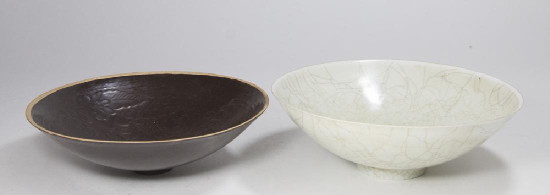 2 Chinese Bowls: 1 with craquelure, approx. 2 3/4" H x 8 1/4" D; and brown bowl with incised floral pattern.