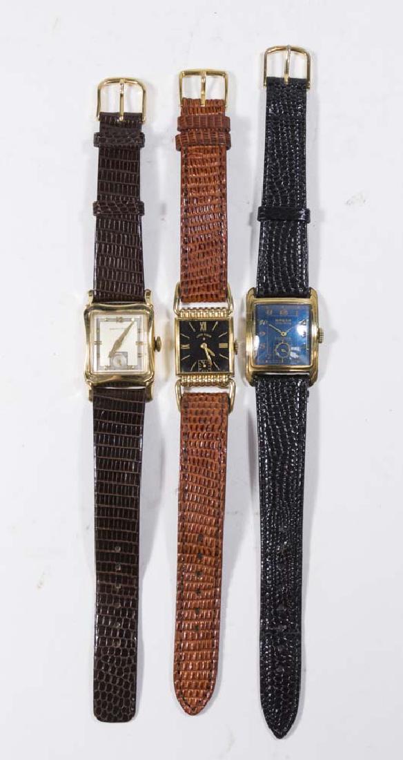 Lot of 3 Vintage Men's Wrist Watches: Including 1940's Gruen Veri-Thin with blue dial 10k gold filled case, Lord Elgin 10k gold filled ( missing glass), Hamilton 10k gold filled case. (6152)