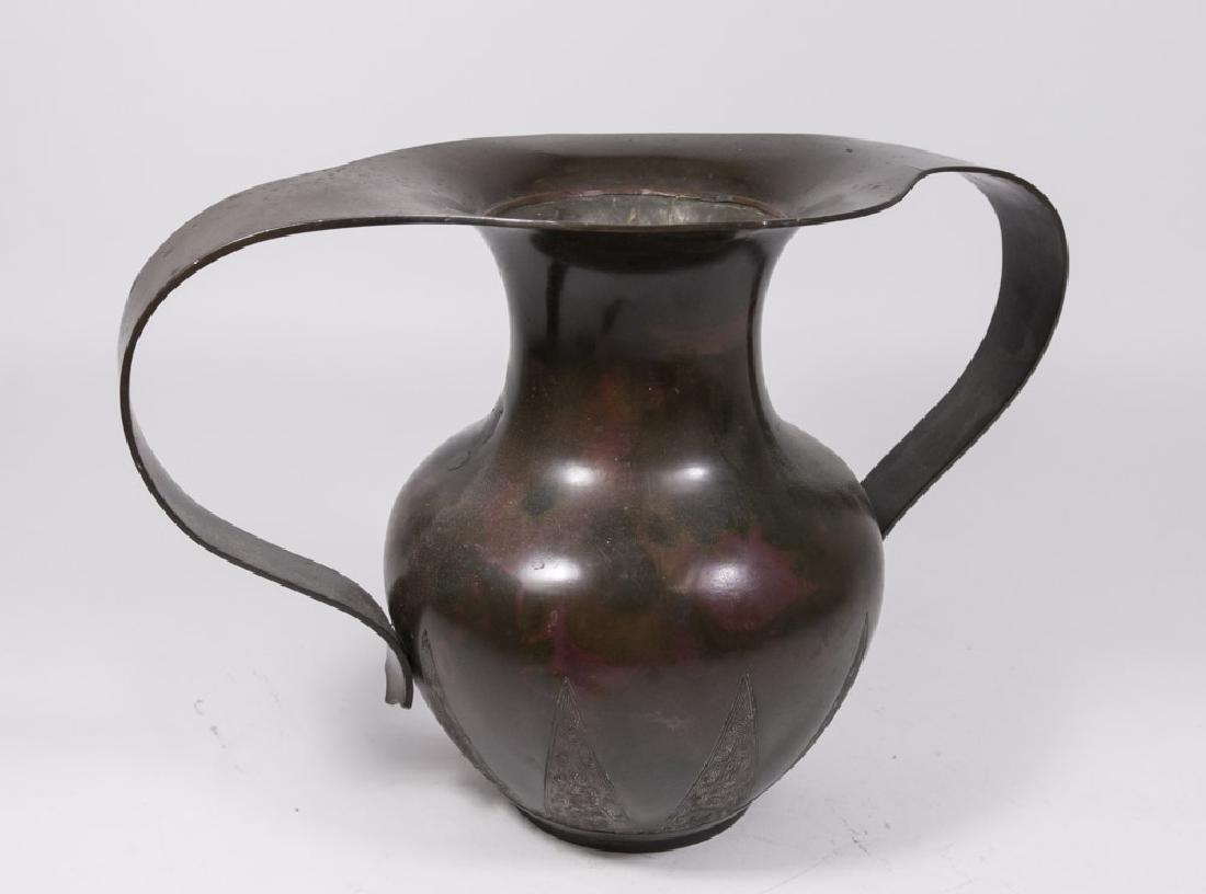 Bronze Hand Wrought Vase with Handles: Incised design. Approx. 10 1/4" x 14 1/4". Property from the collection of Hank Willoughby, Allenwood, NJ.