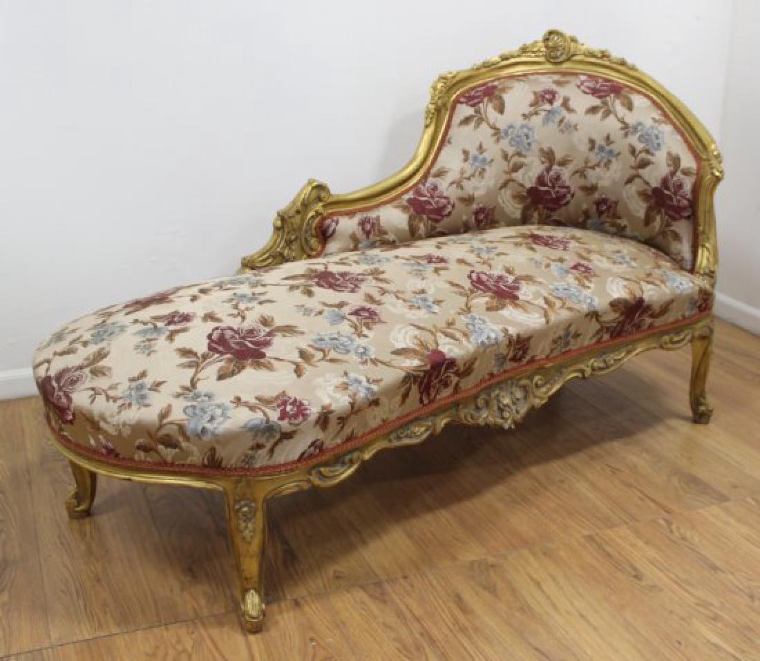 Louis XV Style Carved Chaise Lounge: Contemporary. Gilt wood, floral design. Approx. 41" high, 75" long.