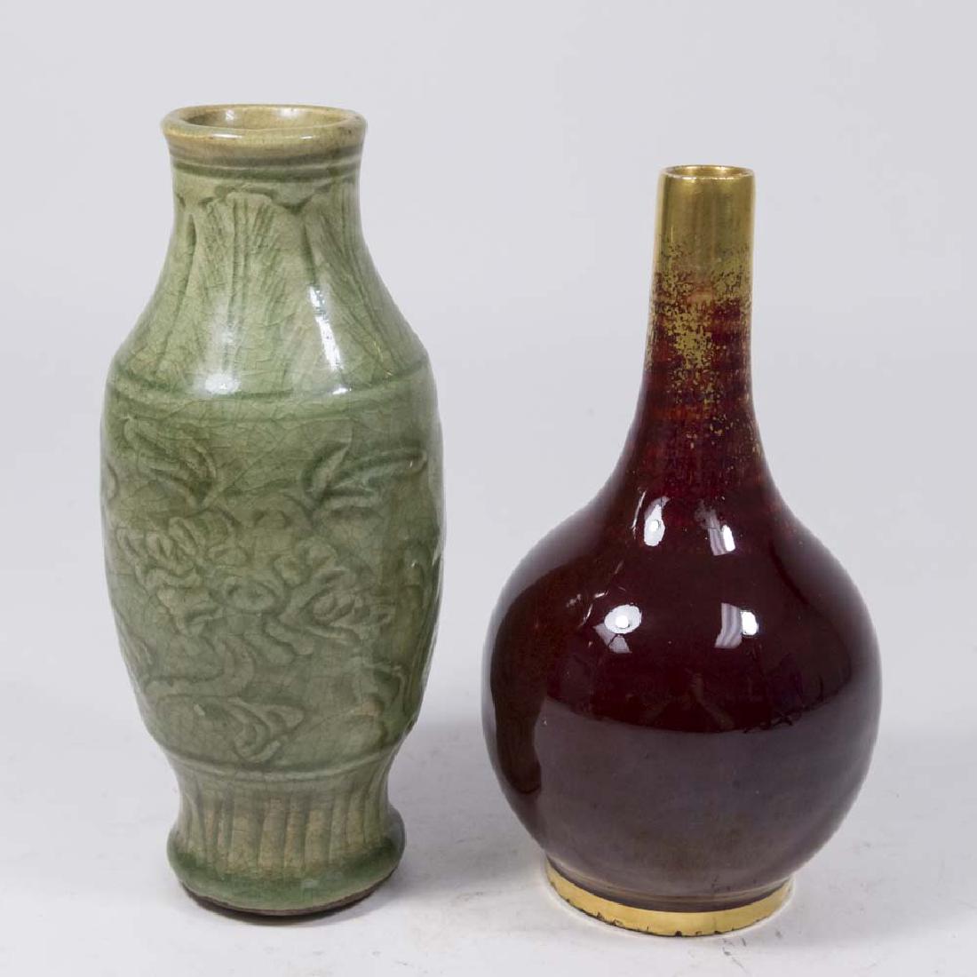 Celadon Vase & Chinese Vase: Celadon approx. 8 1/2" H and Chinese approx. 8" H. Property from the collection of Hank Willoughby, Allenwood, NJ. Flakes on edge of red vase.