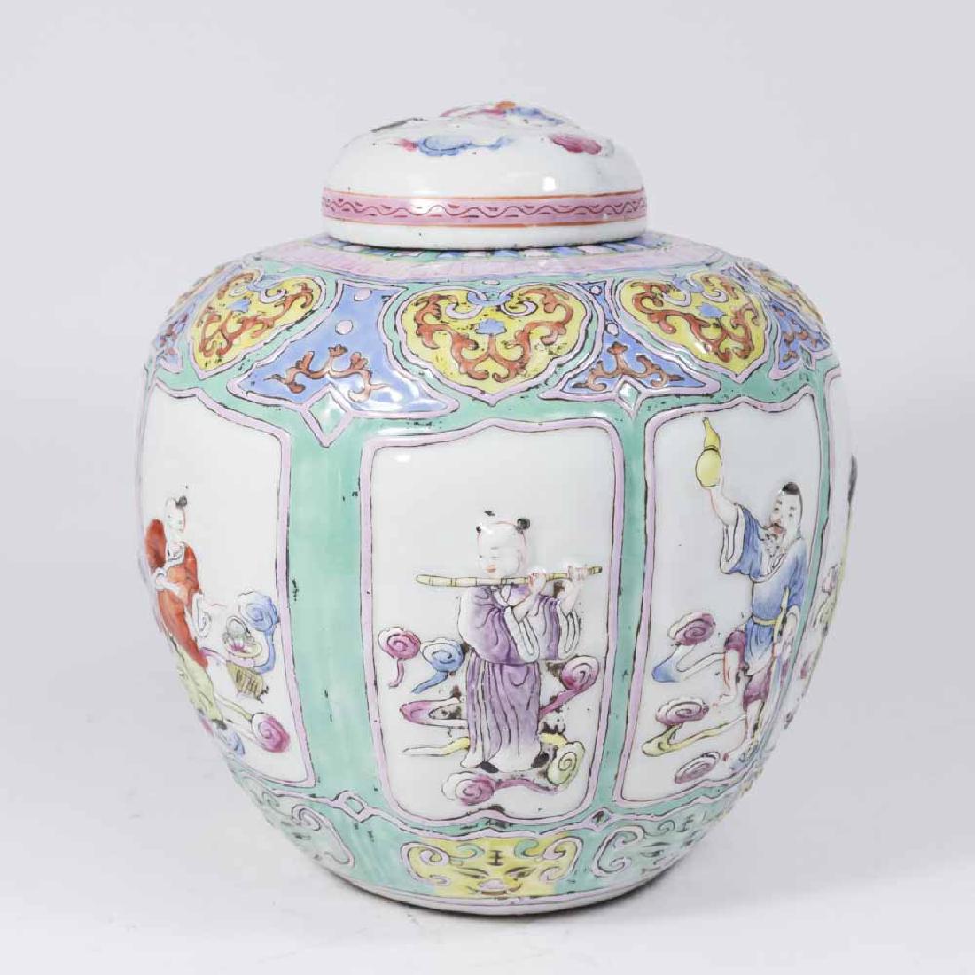 Chinese Covered Porcelain Paneled Jar: Stamped China. Approx. 10" high