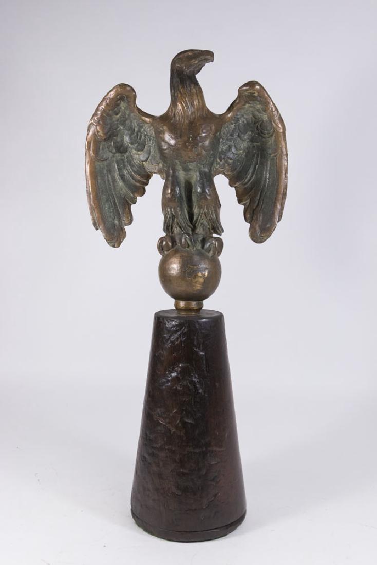 Metal Eagle Topper: Mounted on wood base. Approx. 14" without base, 25 1/2" total. Property from the collection of Hank Willoughby, Allenwood, NJ.