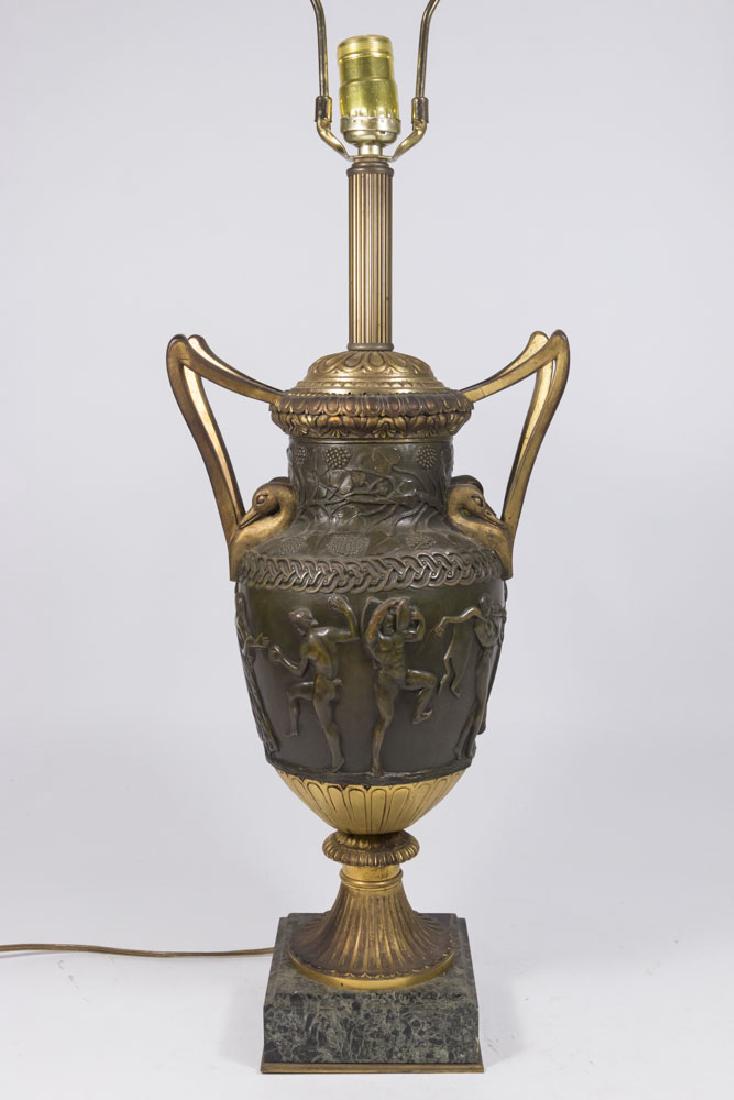 Bronze Urn Mounted as Lamp: With swan handles, mythological relief with marble base. Approx. 17" high to handles. (6171)