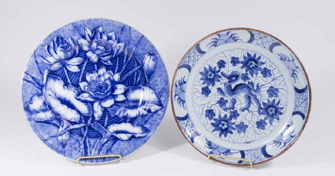 Joost Brown Delft Plate & Wedgwood Floral Plate: Joost Brown Delft plate, floral design, 18th century, approx. 9 1/2". Wedgwood blue and white floral plate, approx. 10 1/4".