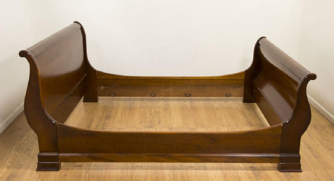 Empire Style Mahogany Bed: Headboard approx. 42 1/2" H, footboard approx. 34 1/2" H x 65" W. From the home of a N.Y. designer.