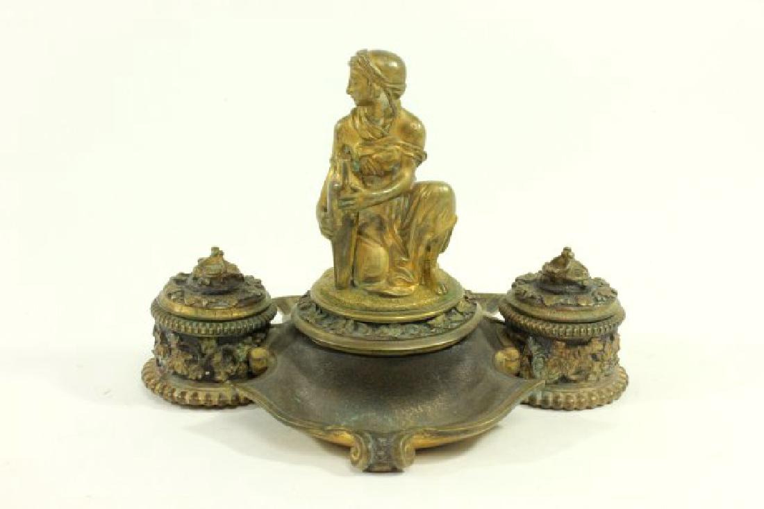 Bronze Figural Inkwell, Rebecca at the Well: Artist signed on back - A. Clerge. Approx. 4 3/4" H x 6 1/2" W. Missing one insert.