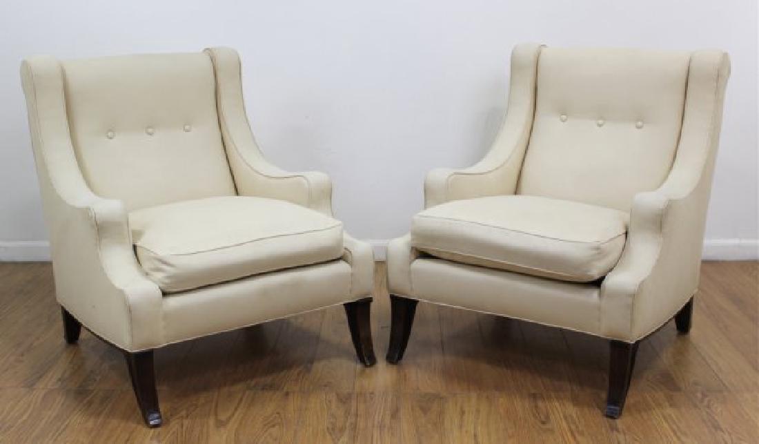 Pair French 40s Style Mahogany Club Chairs: Upholstered in cream cotton. Approx. 35" H x 28 1/2" W x 33" D. Property from the Erno Laszlo Institute, West Broadway, NYC. (6191)