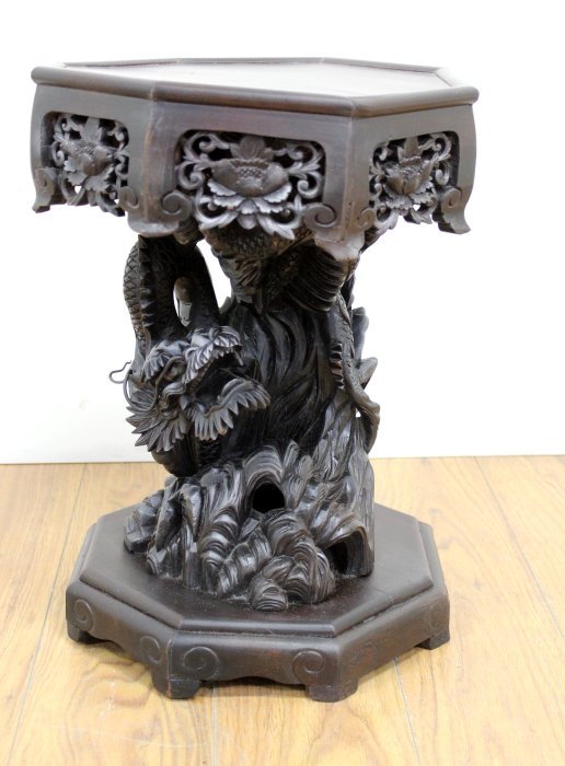 Chinese Carved Figural Wood Stand: Decorated with dragon. Approx. 16" H. (6183.36) Top is bent.