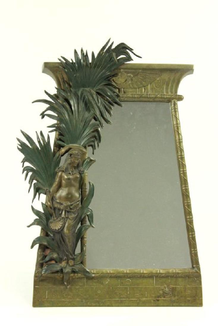 Bronze Egyptian Revival Table Mirror: With semi-nude woman and palm trees. Approx. 18 3/4" H x 11 3/4" W.