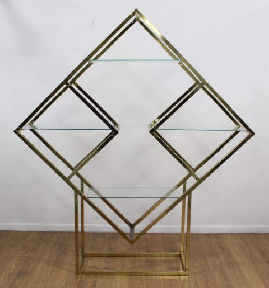 American 70s Brass Open Bookcase: Approx. 78" H x 68 1/2" W x 14 1/2" D.