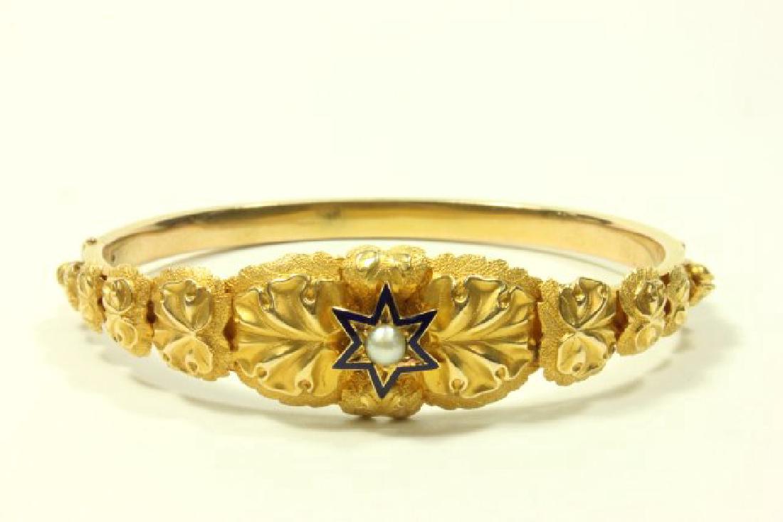 Gold Bangle Bracelet with Pearl in Enamel Star: Approx. 7.3 dwt.