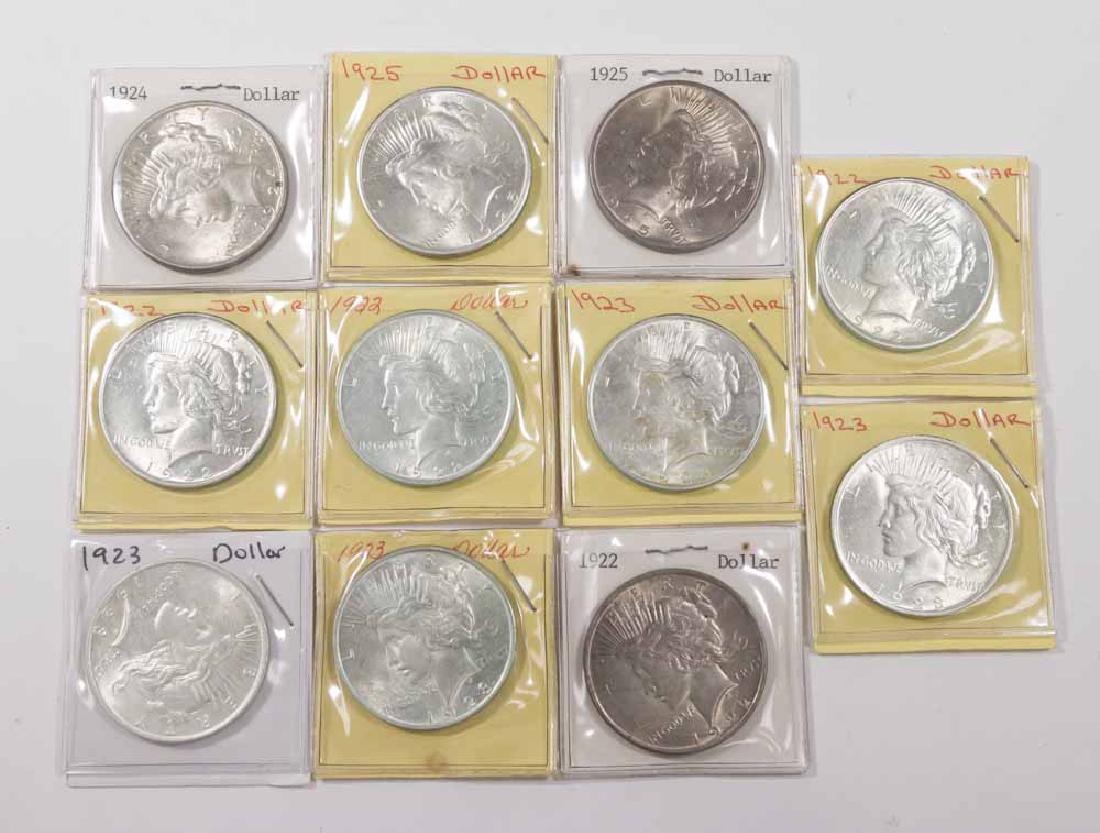 Lot 11 Silver Peach Dollars: Including 4x 1922, 4x 1923, 1x 1924, 2x 1925.